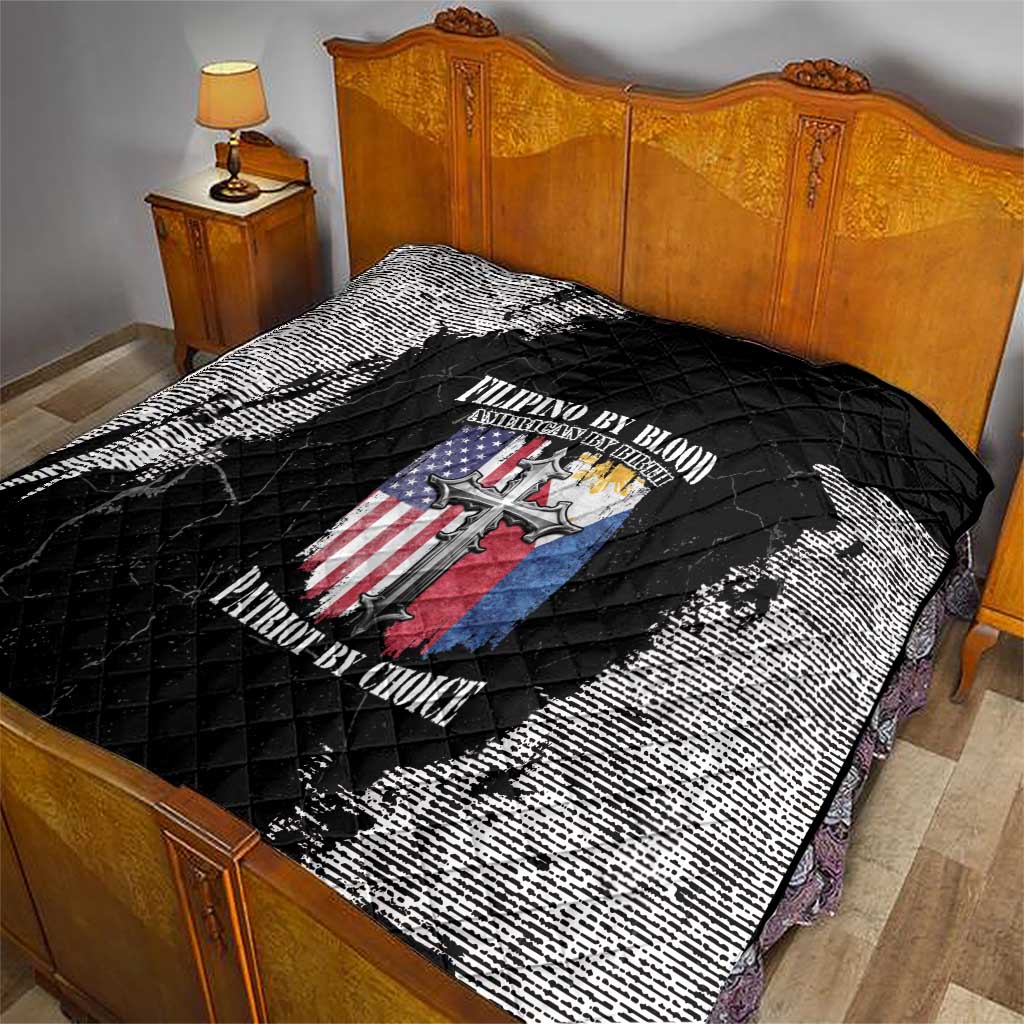 Black and white quilt on a bed, quilted diamonds with centered patriotic emblem