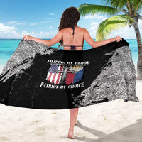 Black and white grunge print sarong with bold crest logo centered