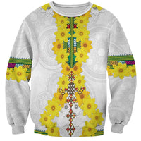 Unisex white crewneck sweatshirt with gray motifs, yellow flower pattern, colorful vertical stripe