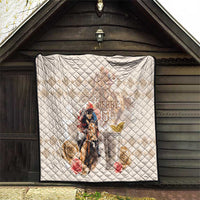 Beige quilt hanging indoors with diamond stitching, horse rider graphic and roses