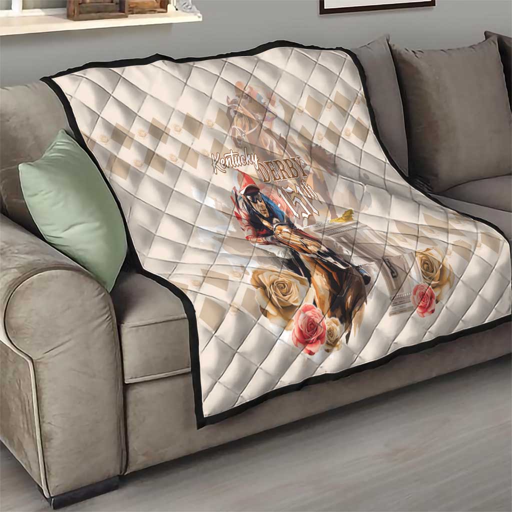 Beige quilt throw on sofa with diamond stitching and horse-rider and roses graphic