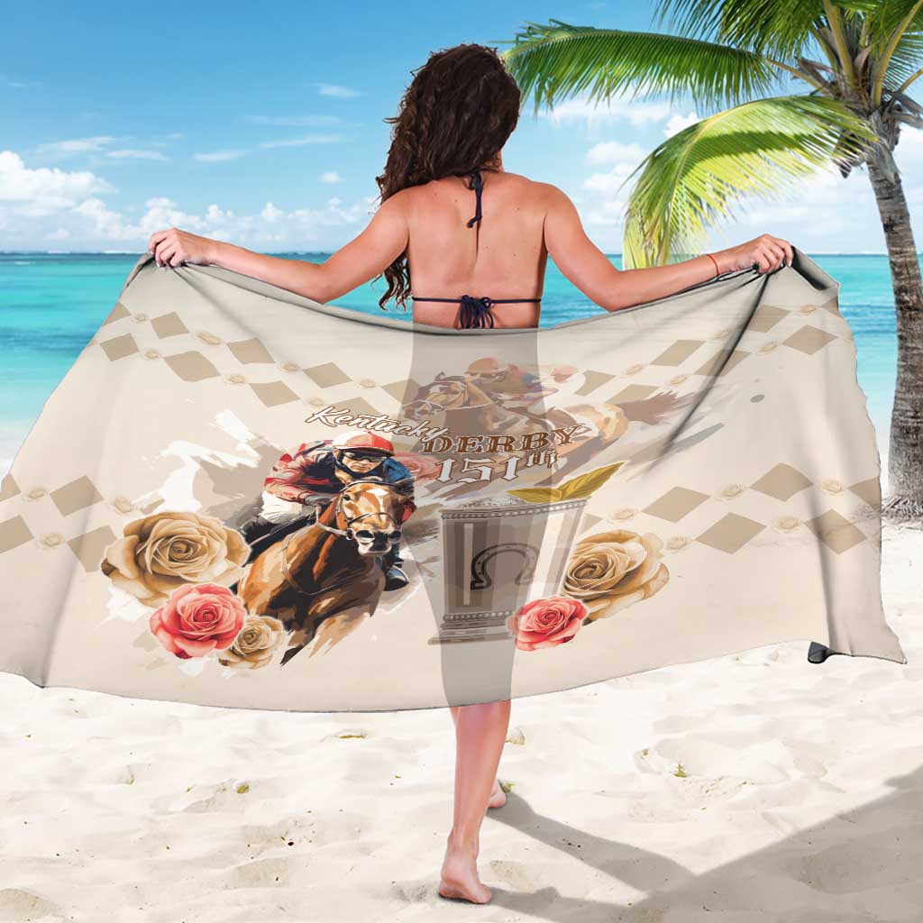 Beige sarong with centered Derby 151 horse-and-jockey graphic and check pattern
