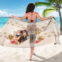 Beige sarong with centered Derby 151 horse-and-jockey graphic and check pattern