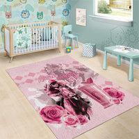 Pink kids room area rug with horse derby artwork, roses, and pink geometric pattern.