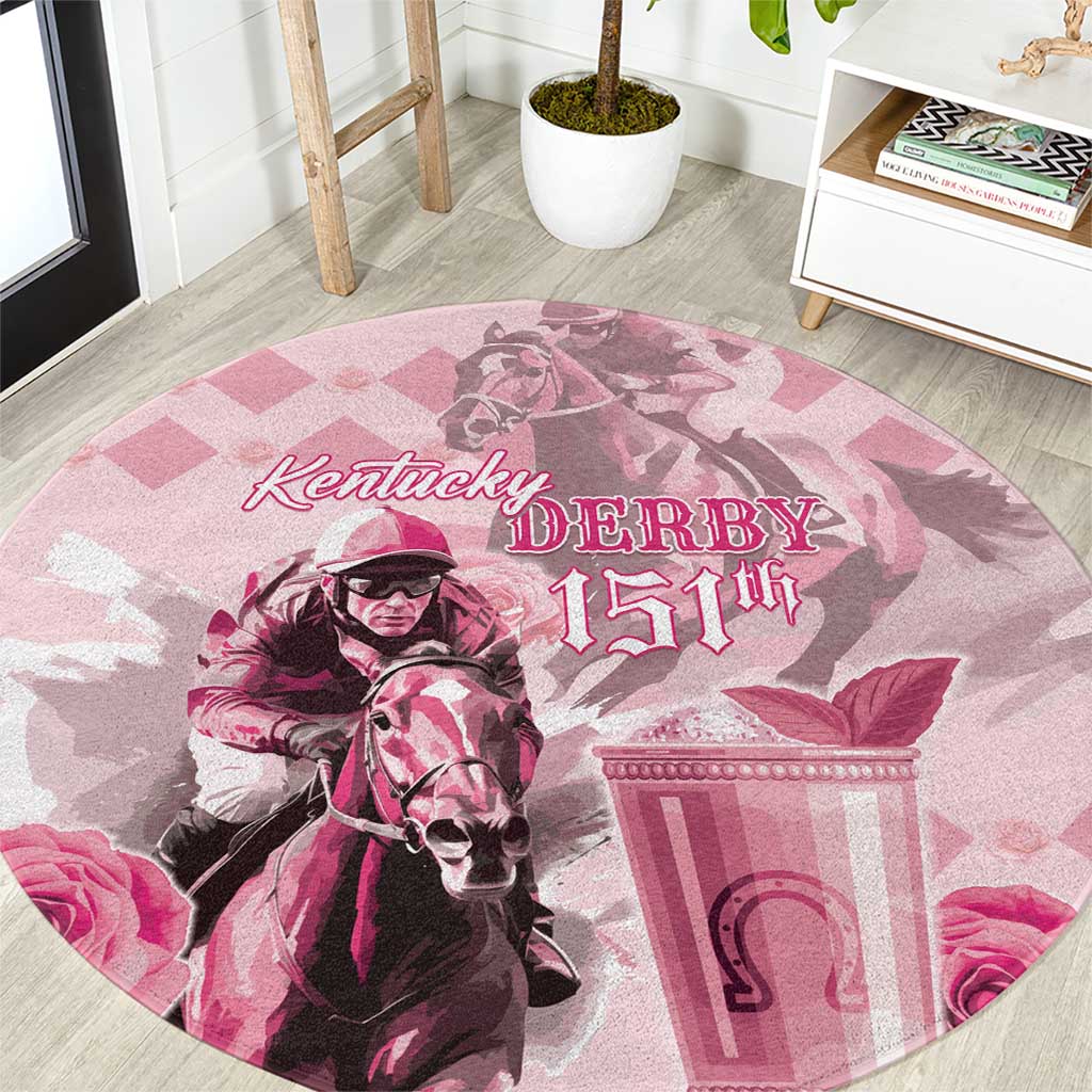 Pink round carpet with Kentucky Derby 151st logo, horse rider, and mint julep cup art