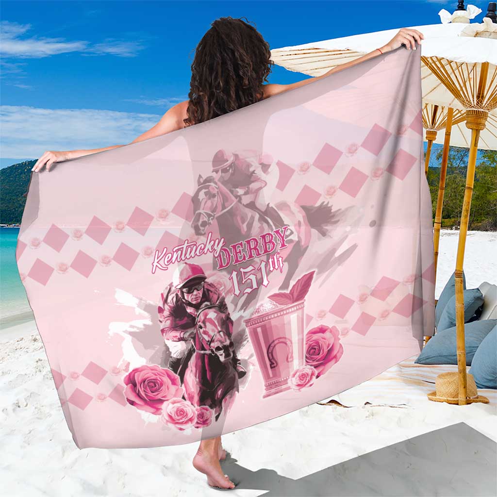 Pink horse-racing sarong with roses and 151st anniversary graphic, draped over shoulders