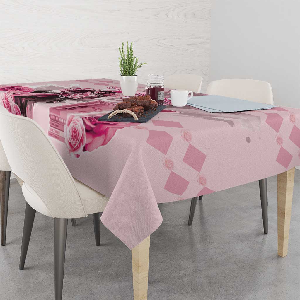 Pink tablecloth with rose and diamond print, draped over dining table