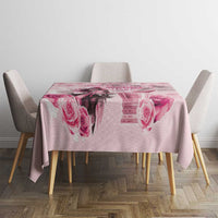 Pink tablecloth with rose and diamond pattern, on dining table with chairs