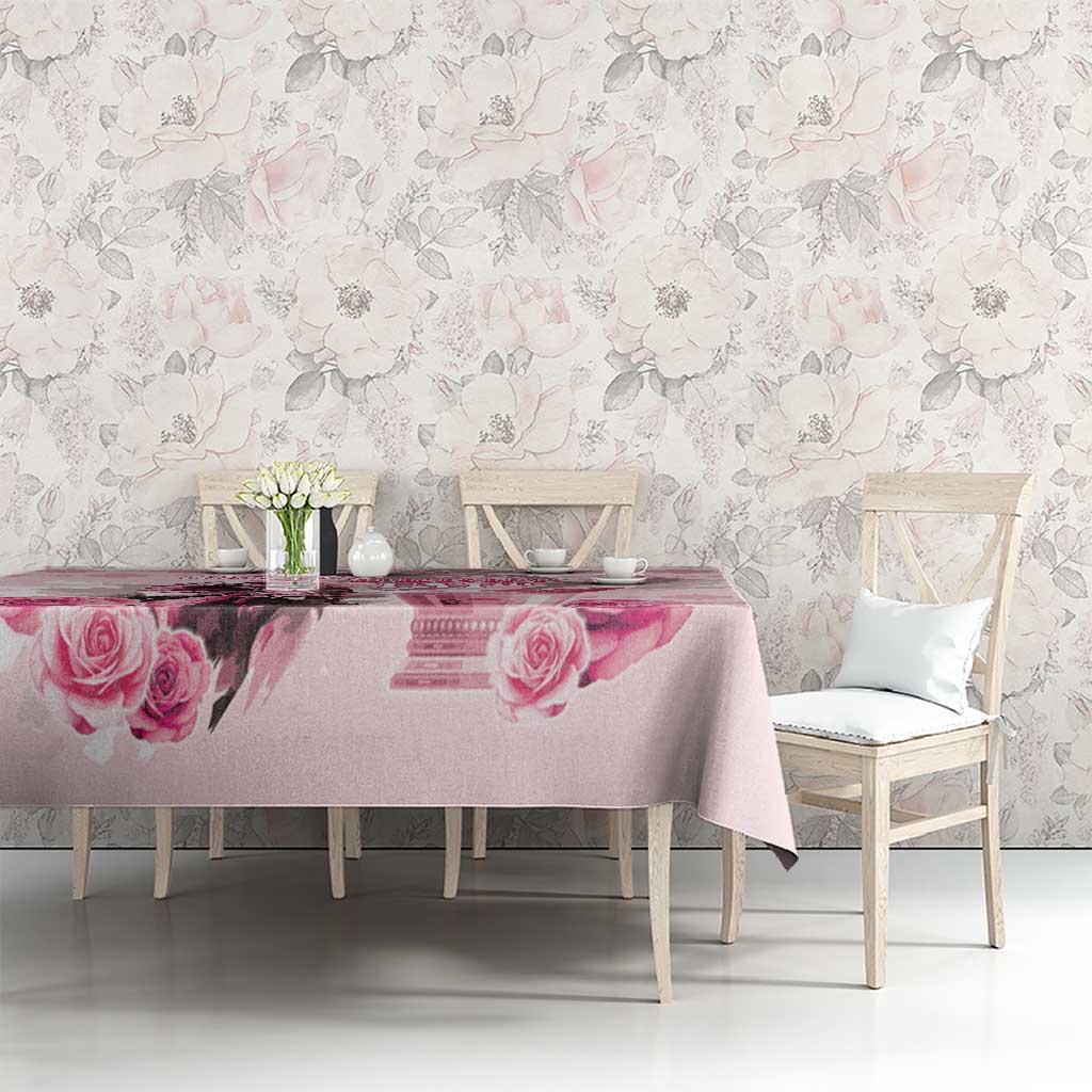 Pink tablecloth with rose and diamond print, draped across dining table