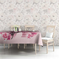 Pink tablecloth with rose and diamond print, draped across dining table
