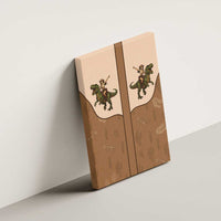 Beige canvas wall art with retro cowboy and green dinosaur print, side view on wall