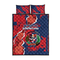 Red and blue quilt bed set with Dominican crest, map print, and two pillows