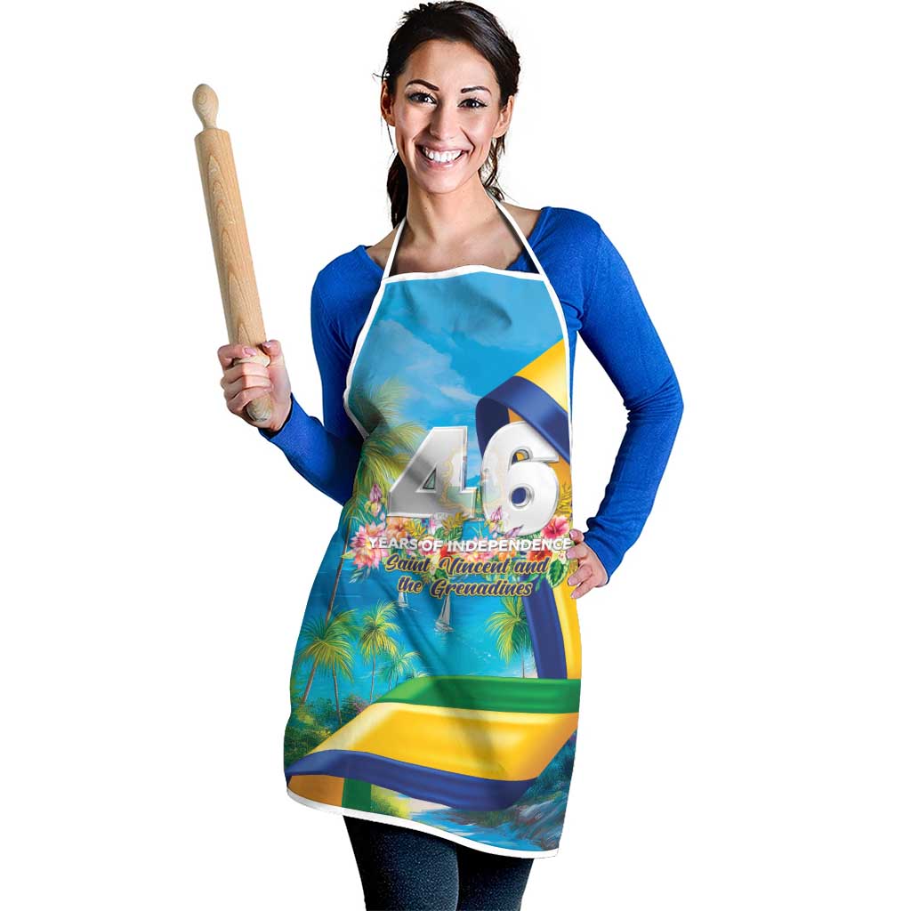 Blue independence apron with white straps and colorful country-themed graphic print