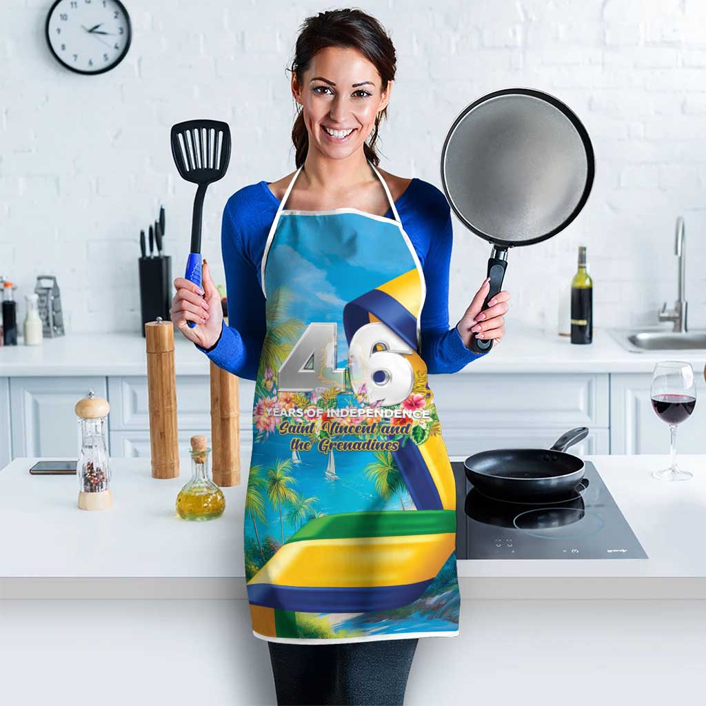 Blue independence apron with white neck and waist straps, featuring large independence banner