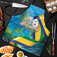 Blue independence apron with white ties, colorful palm and ribbon-style graphic print