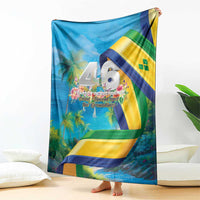 Blue flag-themed blanket draped upright, showing 46 Years of Independence center design