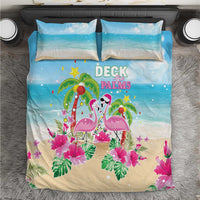 Blue and beige holiday bedding set with flamingos, palms, flowers, and stars