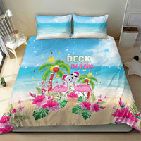 Blue and beige duvet cover with flamingos, palms, and colorful holiday confetti