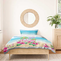 Blue and beige flamingo and palm duvet with decorative pillow shams on wooden bed