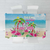 Blue holiday tablecloth with flamingos, palms, and festive tropical flowers