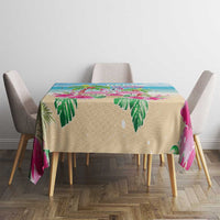 Beige and blue tropical tablecloth with flamingos and palm accents