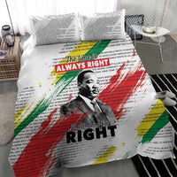 White duvet cover and pillowcases featuring MLK portrait and “Do what is RIGHT” text
