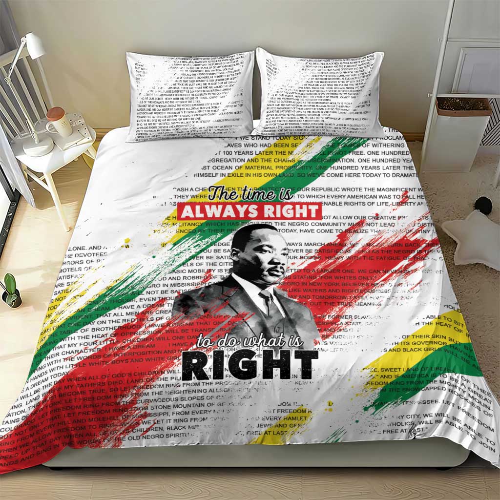 White bedding set with MLK portrait and multicolor paint-style rays on duvet cover