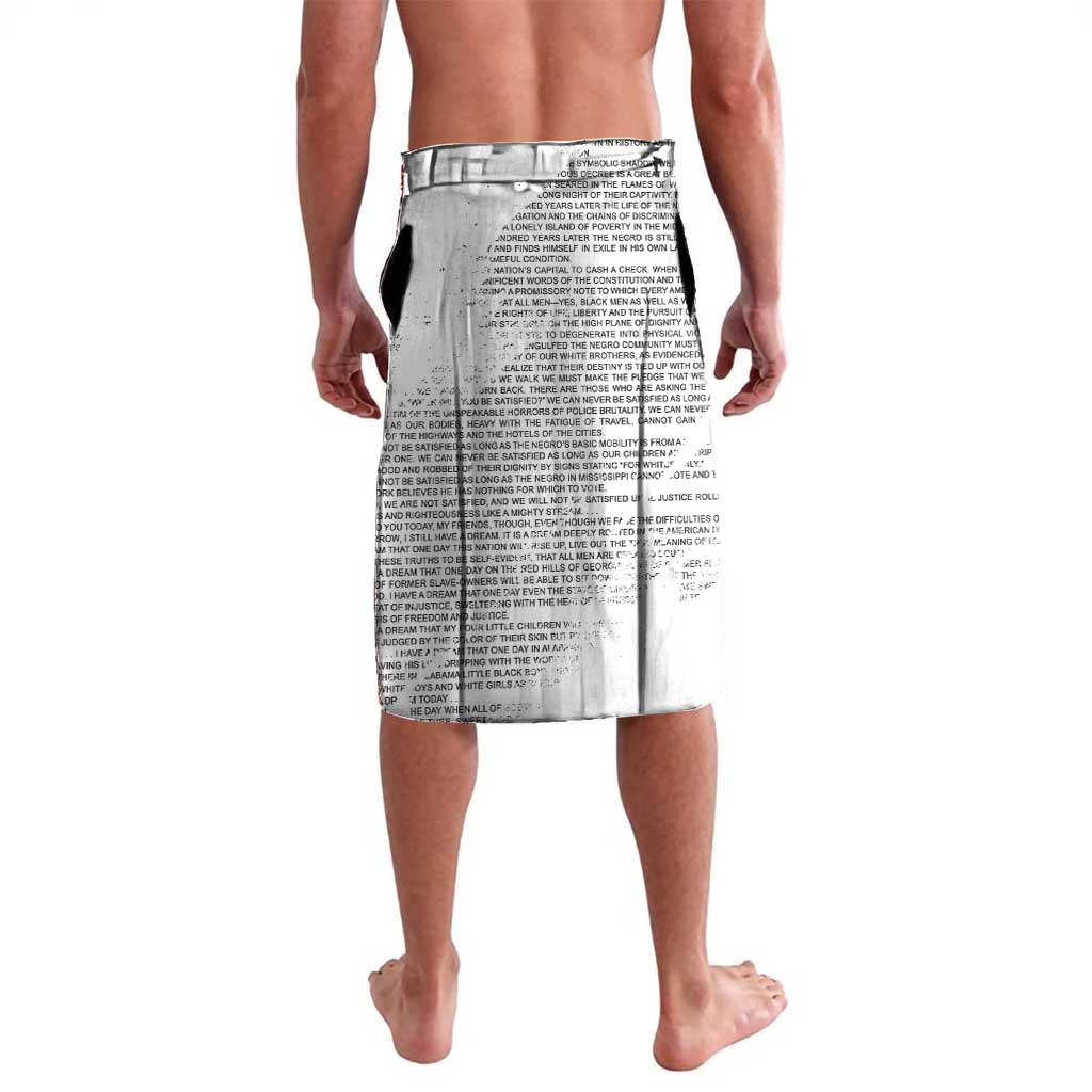 White printed lavalava wrap skirt with all-over text pattern and curved hem