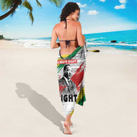 White printed sarong with red and green diagonal graphics and central Martin Luther King portrait