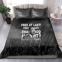 Black bedding set with “Free at last” MLK quote on duvet and two pillowcases