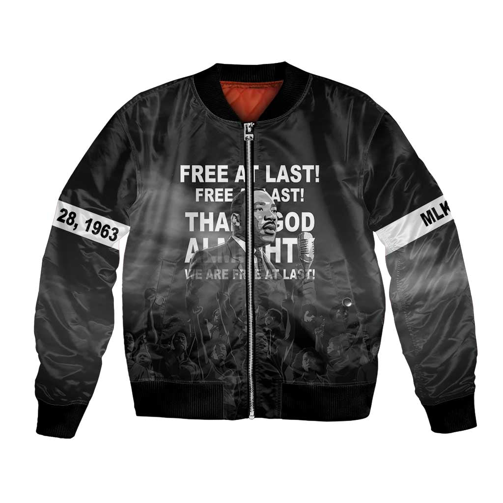 Unisex black bomber jacket with front zipper and MLK portrait “Free at last” graphic