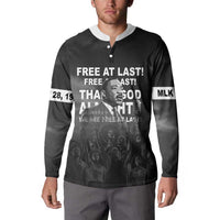 Black button-up sweatshirt on model, front button placket and MLK slogan graphic