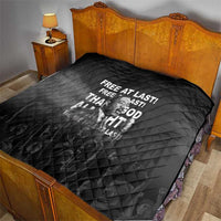 Black quilt with diamond stitching and Martin Luther King portrait, "Free at last" text