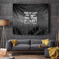 Black wall tapestry with Martin Luther King Jr portrait, quote text, and crowd silhouettes
