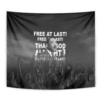 Black tapestry close-up with Martin Luther King Jr portrait and quote text