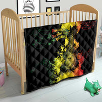 Black quilt blanket on a crib with Afro music portrait and musical notes print