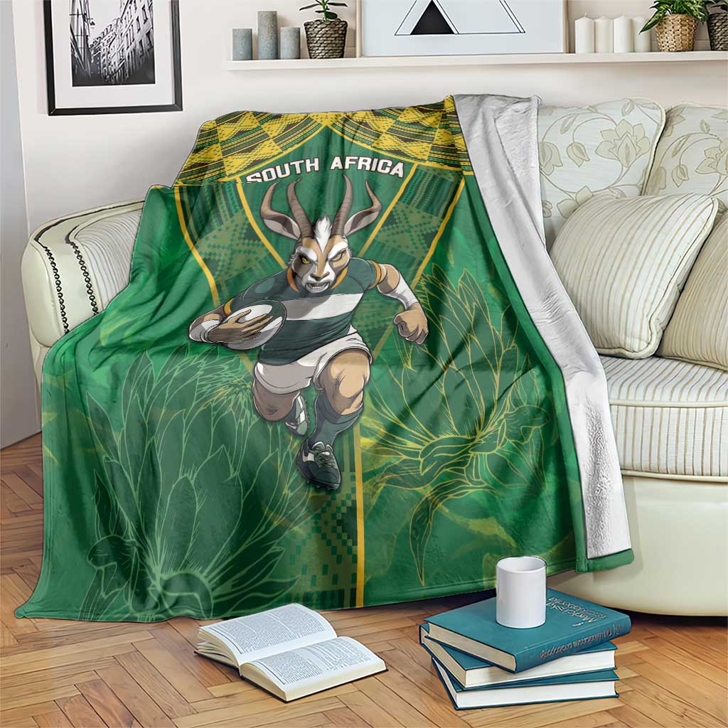 Green rugby blanket with running springbok mascot and bold "SOUTH AFRICA" text