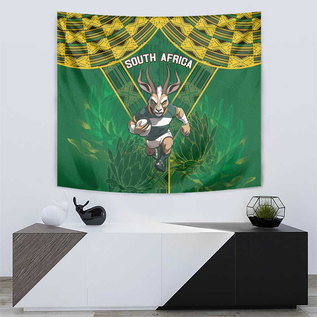South Africa rugby tapestry on white wall, green field with yellow patterns and antelope graphic