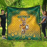 Yellow quilt blanket with green edge, Australia text, kangaroo and ball graphic, quilted