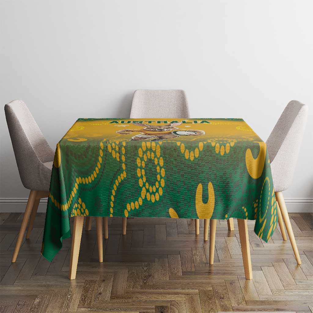 Yellow and green Aboriginal pattern tablecloth covering table with chairs
