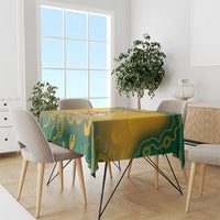 Yellow and green Aboriginal pattern tablecloth on dining table in bright room