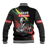 Black baseball jacket with ribbed striped cuffs and back MLK 1963 text graphic