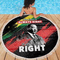 Black round beach blanket with fringed edge, portrait and large 'RIGHT' letter design
