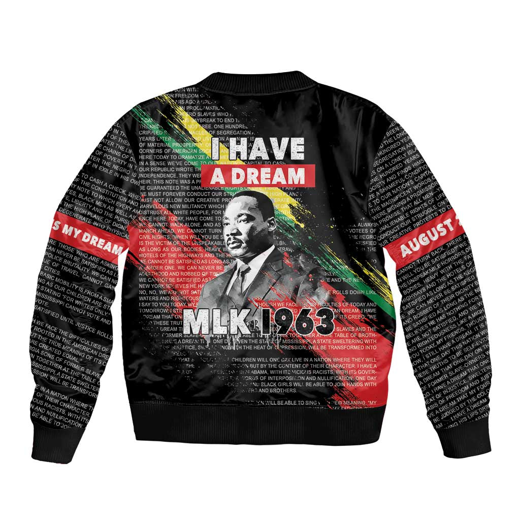 Black unisex bomber jacket with back graphic text 'I Have a Dream' and face portrait