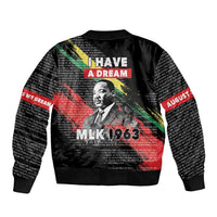 Black unisex bomber jacket with back graphic text 'I Have a Dream' and face portrait