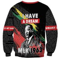 Black unisex sweatshirt with red crew neck, I Have a Dream text and MLK portrait