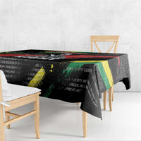 Black tablecloth with corner fold, colorful diagonal stripe panel and printed quotes