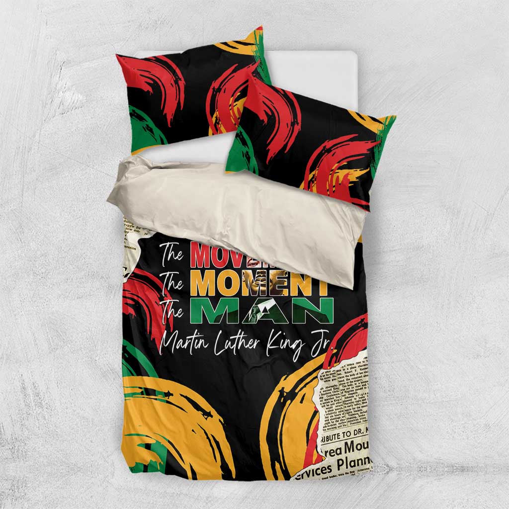 Black bedding set with two pillowcases featuring red, green, and yellow “Martin Luther King Jr” text