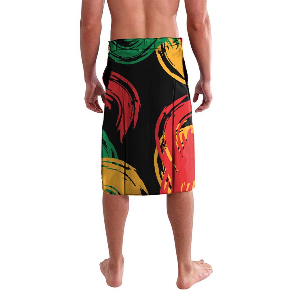 Black lava lava sarong with red, green, and yellow face-style graphic print