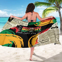 MLK legacy sarong spread wide with multicolor text blocks and yellow-green circular artwork